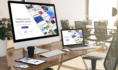 Canvas Print - computer, laptop, tablet, and phone with responsive website builder at office mockup