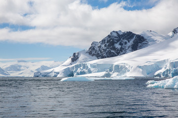 ice in the Antarctica with iceberg in the ocean