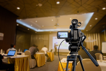Wall Mural - video camera recording presentations in the seminar room
