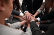 © ASDF - Close-Up of hands business team showing unity with putting their hands together.