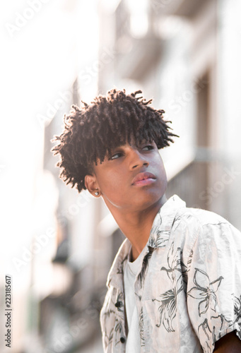 Hispanic Black Young Man Model With Afro Curly Hair Portrait