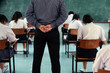 Teachers stand strict test or exam.