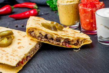 Quesadilla with beef and sauces