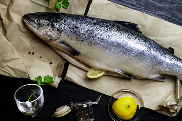 Fresh salmon on a rustic table. Flat lay. Healthy food concept, omega 3 source