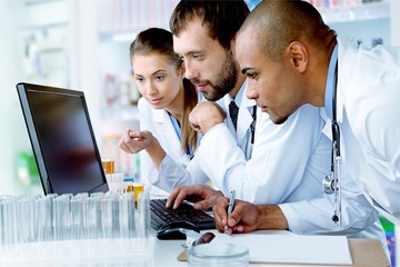 Wall Mural - Group of the scientists working