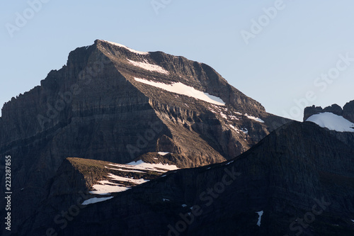 Fotografie, Obraz Mountain peaks at sunset in Glacier National Park, Montana