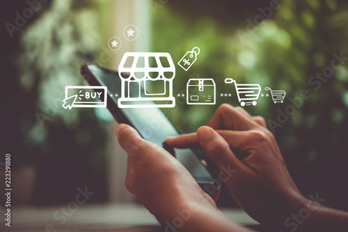 Fotografía Women hand using smartphone do online selling for people shopping online with chat box, cart, dollar icons pop up