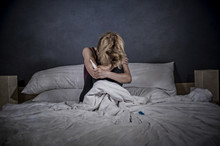 Lifestyle Portrait Of Young Desperate Pregnant Woman Using Pregnancy Test Sad And Depressed For Positive Result Expecting Unwanted Baby Feeling Remorse