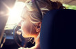 © Syda Productions - summer vacation, holidays, travel, road trip and people concept - happy teenage girl or young woman in car