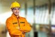 © BillionPhotos.com - Young man in work uniform and yellow