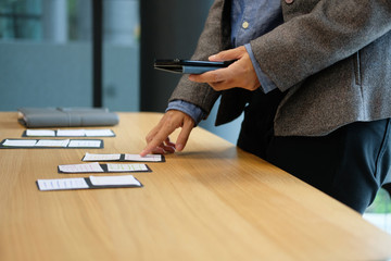 user experience ux designer designing web on smartphone layout. ui planning mobile application. deve