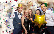 © Syda Productions - celebration, fun and holidays concept - happy friends with golden party props and confetti laughing