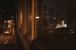 © mavoimages - Asian businessman working late in the city at night
