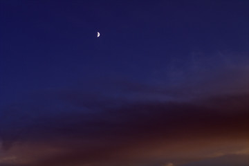moon in the sky,dark,blue,nature,moon,cloud,evening,atmosphere,white