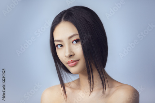 Asian Beauty Woman Skin Care Close Up Beautiful Young With Asian Beauty Woman Skin Care Close Up Beautiful Young With Perfect Face Looking At Camera Isolated On Gray Background Tender Smiling Mixed Race