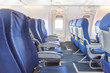 © joneyut - Empty aircraft seats and Emergency door