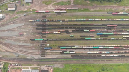 Wall Mural - Branches of the railway at the marshalling yard, a lot of freight wagons from the height. Wagons with coal moving on rails