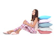 © 5second - Young girl with colorful pillows sitting on white background