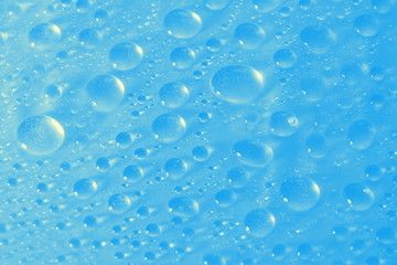 Canvas Print - water drops on blue background texture