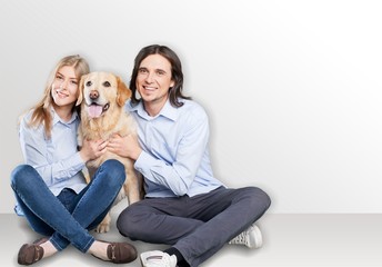 Wall Mural - Young couple in new apartment with  dog