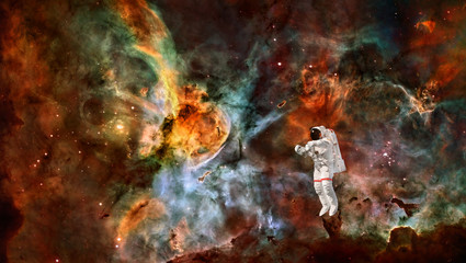 Poster - Astronaut in spacesuit in outer space. Spaceman in the universe. Space nebula. Elements of this image furnished by NASA