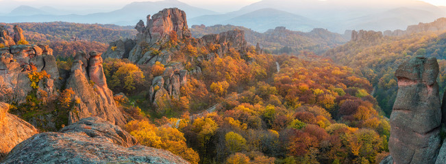 Wall Mural - magnificent morning view of the belogradchik rocks in bulgaria, lit by the autumn sun