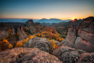 Wall Mural - magnificent morning view of the belogradchik rocks in bulgaria, lit by the autumn sun
