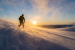 silhouette of man skiing