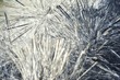 New Year's texture, background of silver bokeh from Christmas holiday tinsel for Christmas and greeting cards