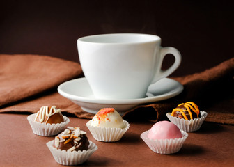 Wall Mural - A cup of coffee and handmade truffles,