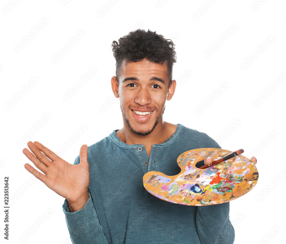 Young African-American artist on white background