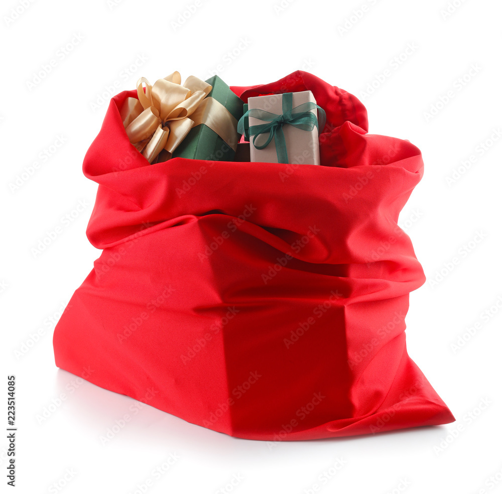 Santa Claus bag full of gifts on white background Stock Photo | Adobe Stock