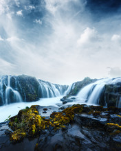 Famous Bruarfoss waterfall with blue water in summer time. Iceland, Europe