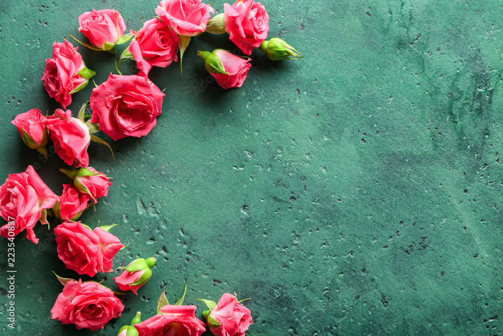 Beautiful blooming flowers on color table