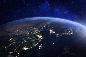 Wall Mural - asia at night from space with city lights showing human activity in china, japan, south korea, hong 