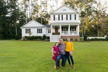 Wall Mural - Dad and Daughters Standing Outside their New Home Farmhouse