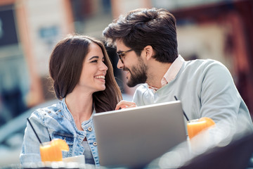 Sticker - Young couple in love sitting in cafe