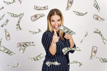 Beautiful Happy Blond Girl With Money Falling Down