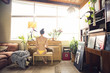 © Cavan Images - Rear view of woman in bikini playing piano at home