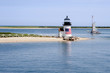 Sailing Past Lighthouse on Nantucket Island on a Summer Day