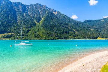 Wall Mural - Boat on water of beautiful Achensee lake on sunny summer day, Tirol, Austria