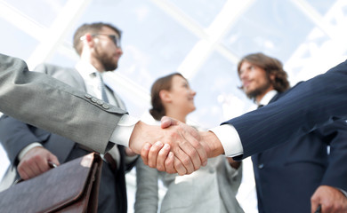 Wall Mural - in the foreground.handshake of business partners