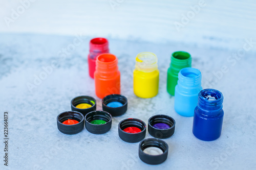 Fotografie, Obraz colorful Gouache or acrylic paints in jars on white grunge background, selective