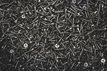 Sticker - Black self-tapping screw. Screws for construction work.