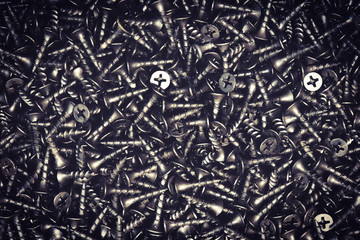 Canvas Print - Black self-tapping screw. Screws for construction work.