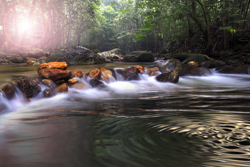 Amazing stream with water ripples on a deep forest in Malaysia.