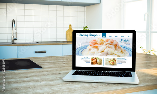 Mockup Of Healthy Recipes Blog Screen Laptop On Cooking Island At Kitchen Stock Photo Adobe Stock
