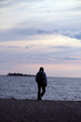 © Катя Кривошеина - Pensive man walking along the shore.
