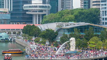 Merlion Lion Fountain Sculpture With Financial Towers On Background Timelapse.