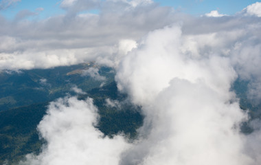 Canvas Print - Clouds over mountains